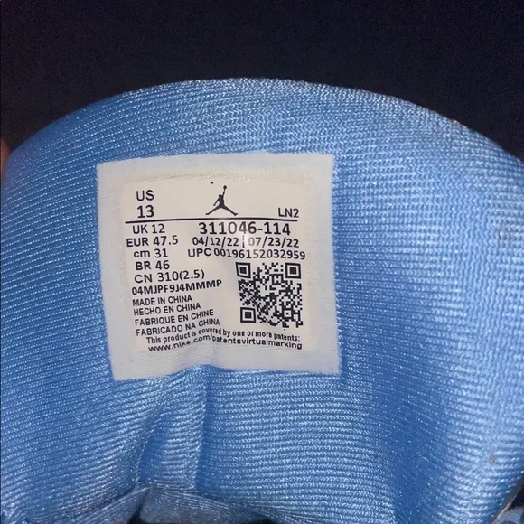 Jordan Sneakers with White, Black, and Blue Highlights